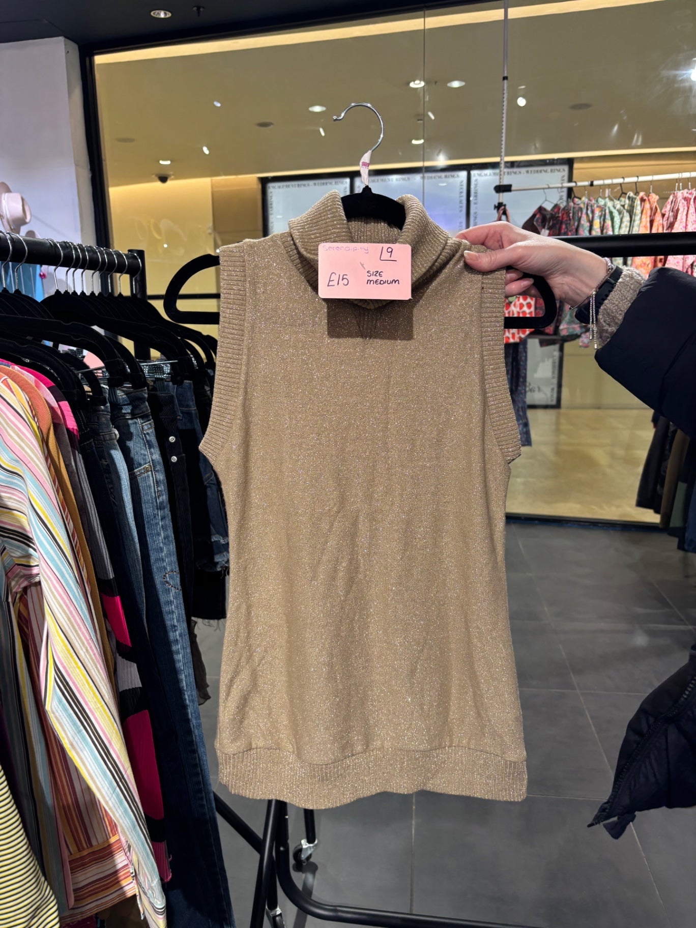 Gold turtle neck vest