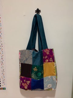 Nine patch, pink yellow green and navy. Blue velour strap