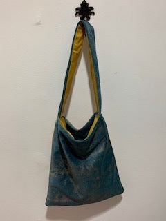 Small bag, gold satin/ blue velour each side. Short blue/gold strap.