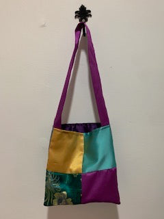 Small, four patch, y/g/blue/pink. Short strap