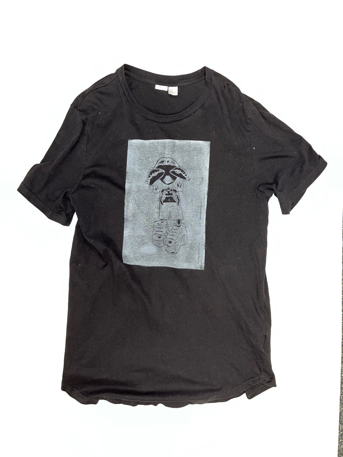 Black t shirt with white cartoon