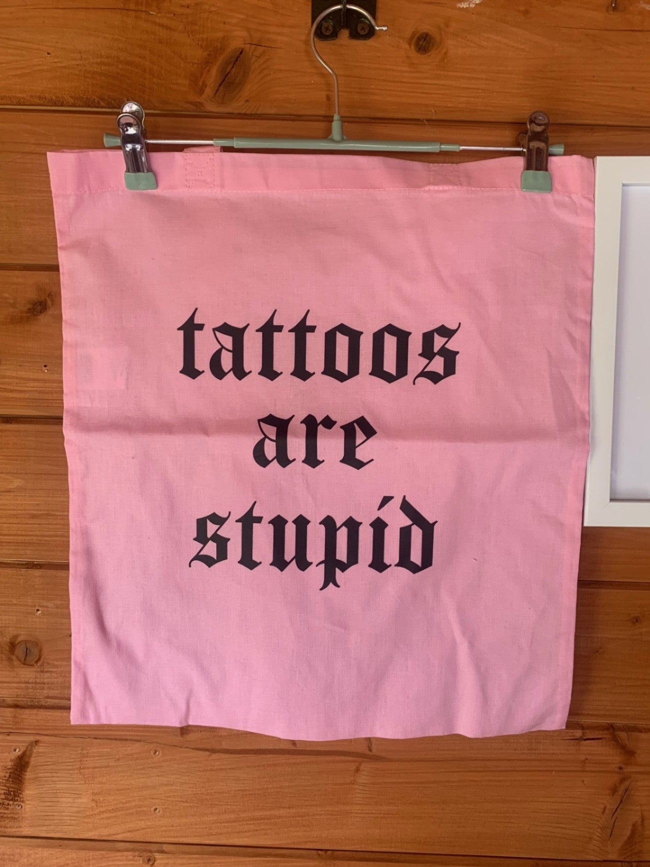 Tattoos are stupid tote bag