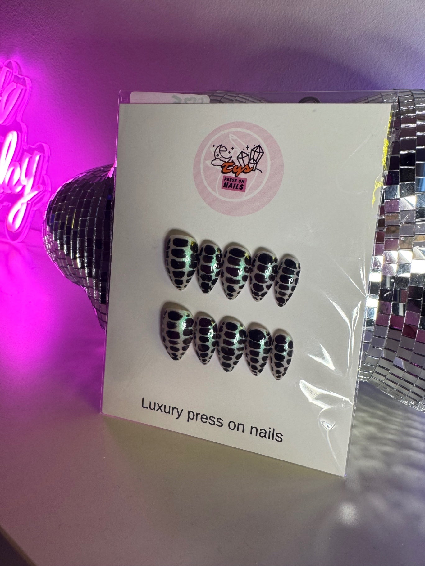 Black snake print on nude shimmer