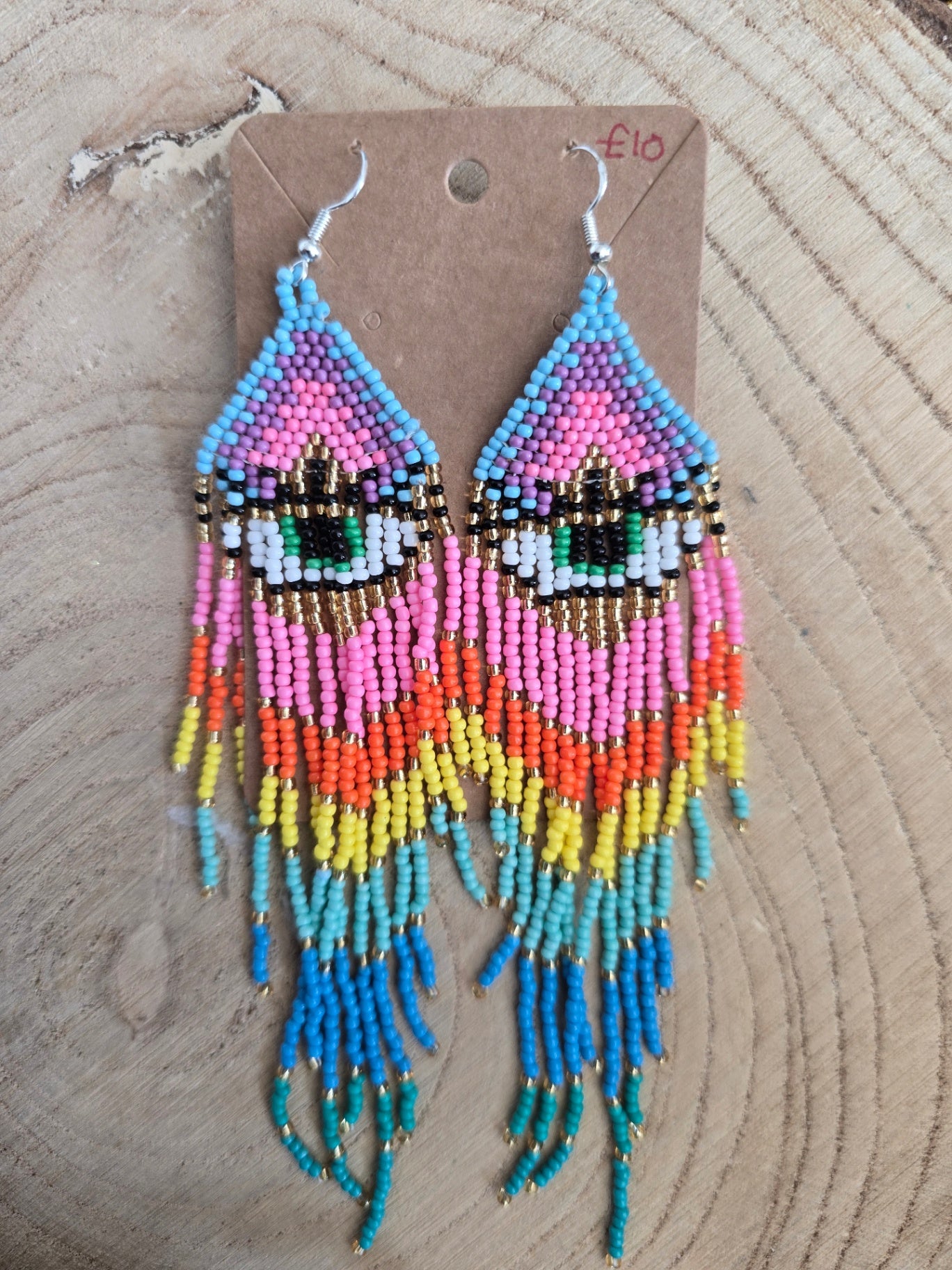 Pink all seeing eye beaded earrings