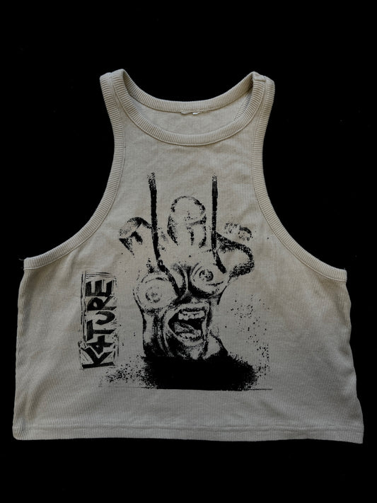 K4TURE beige ‘stop staring at my breasts!’ crop top (Size L)