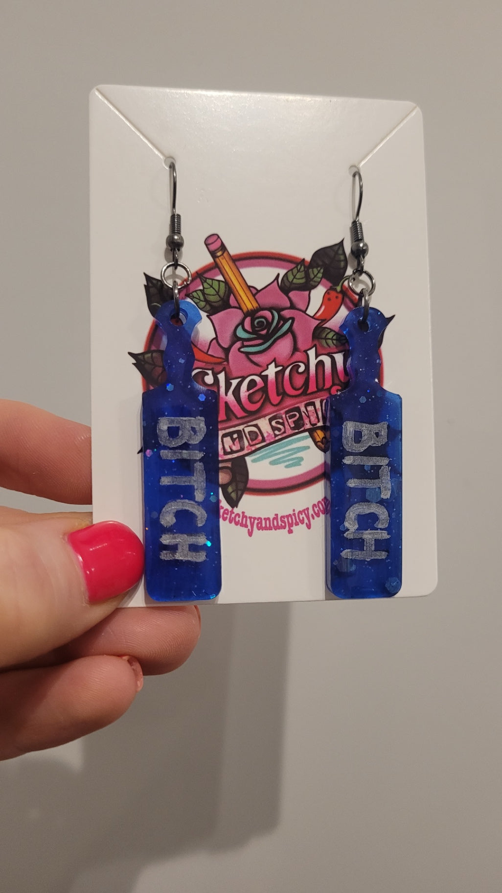 Blue Glitter Paddle Earrings – Silver “BITCH” Text – With Stainless Steel Shepherd Hooks