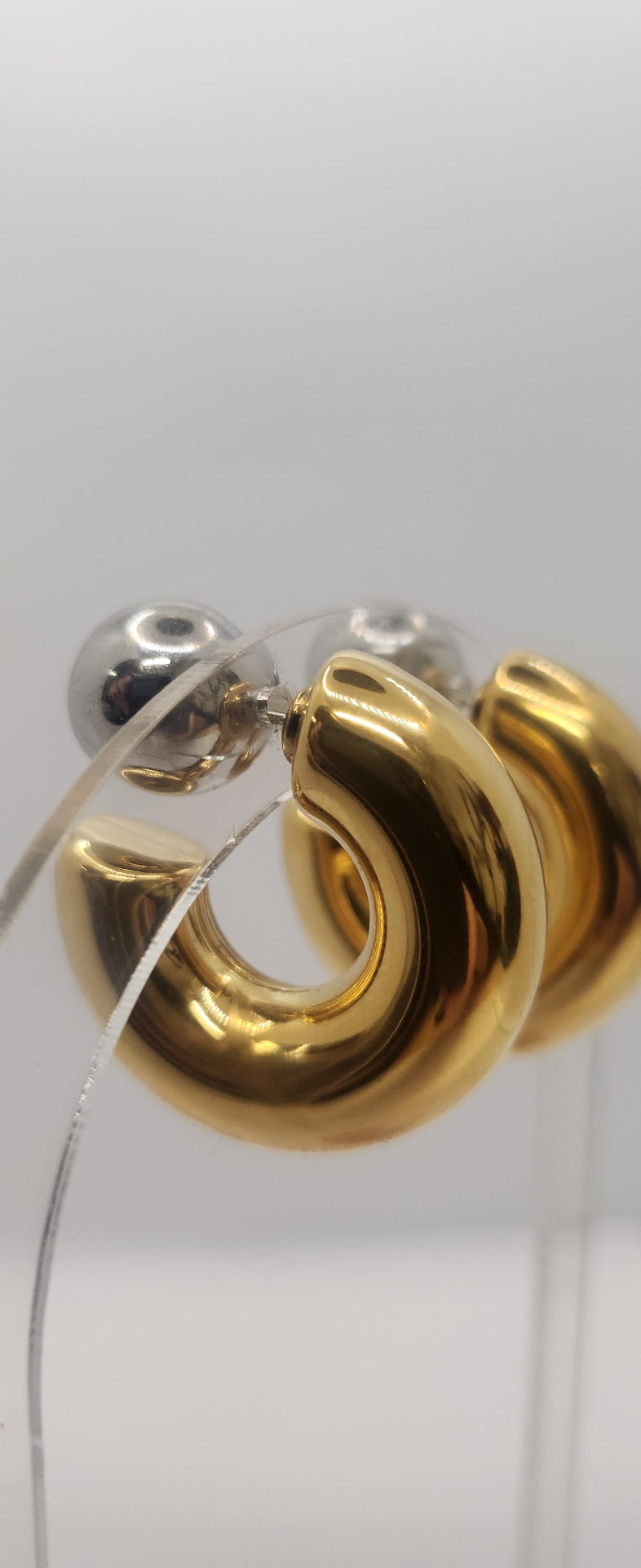 Mixed metal coming shape and ball earrings