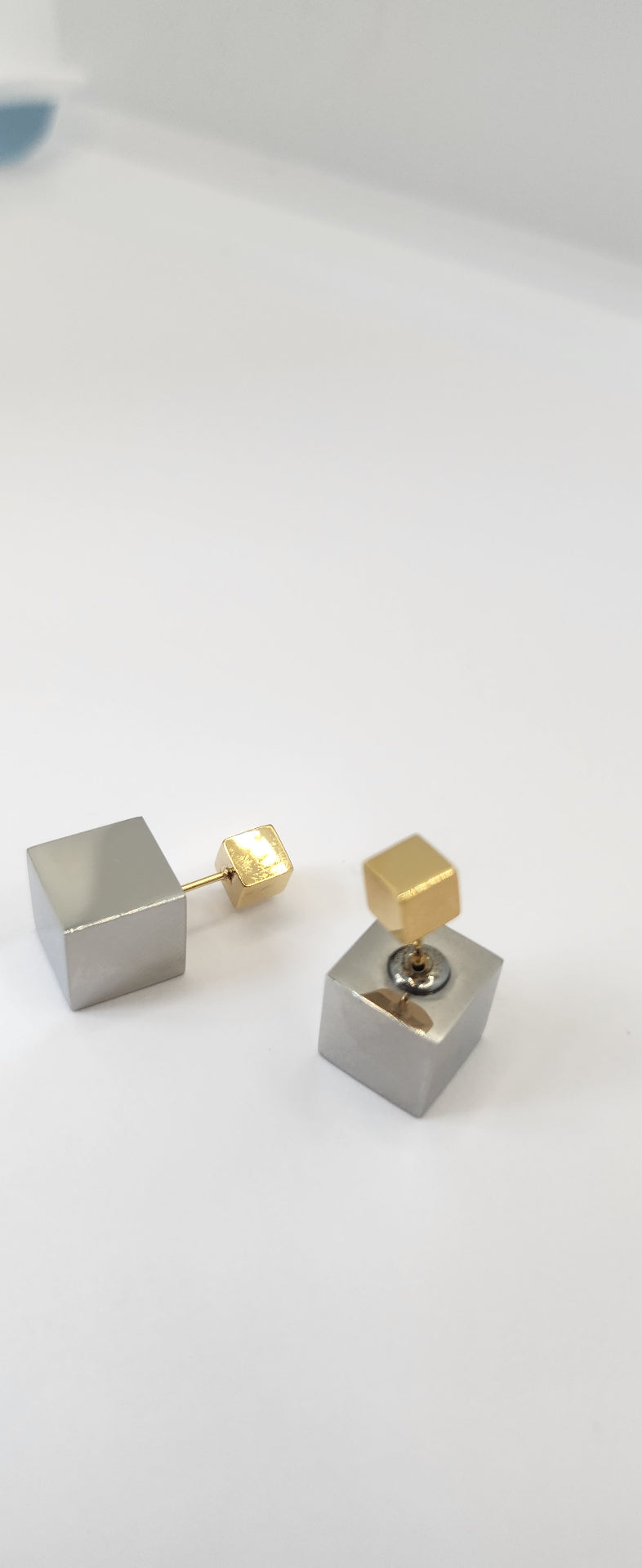 Mixed metal cube studs