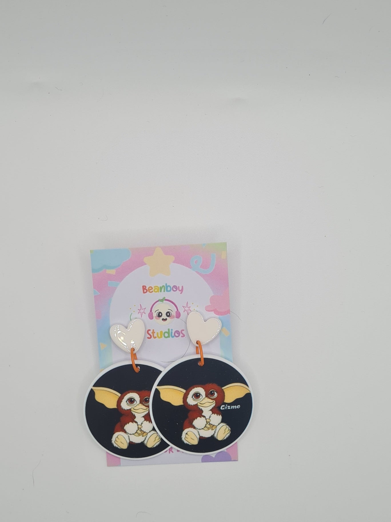 brown monster earrings