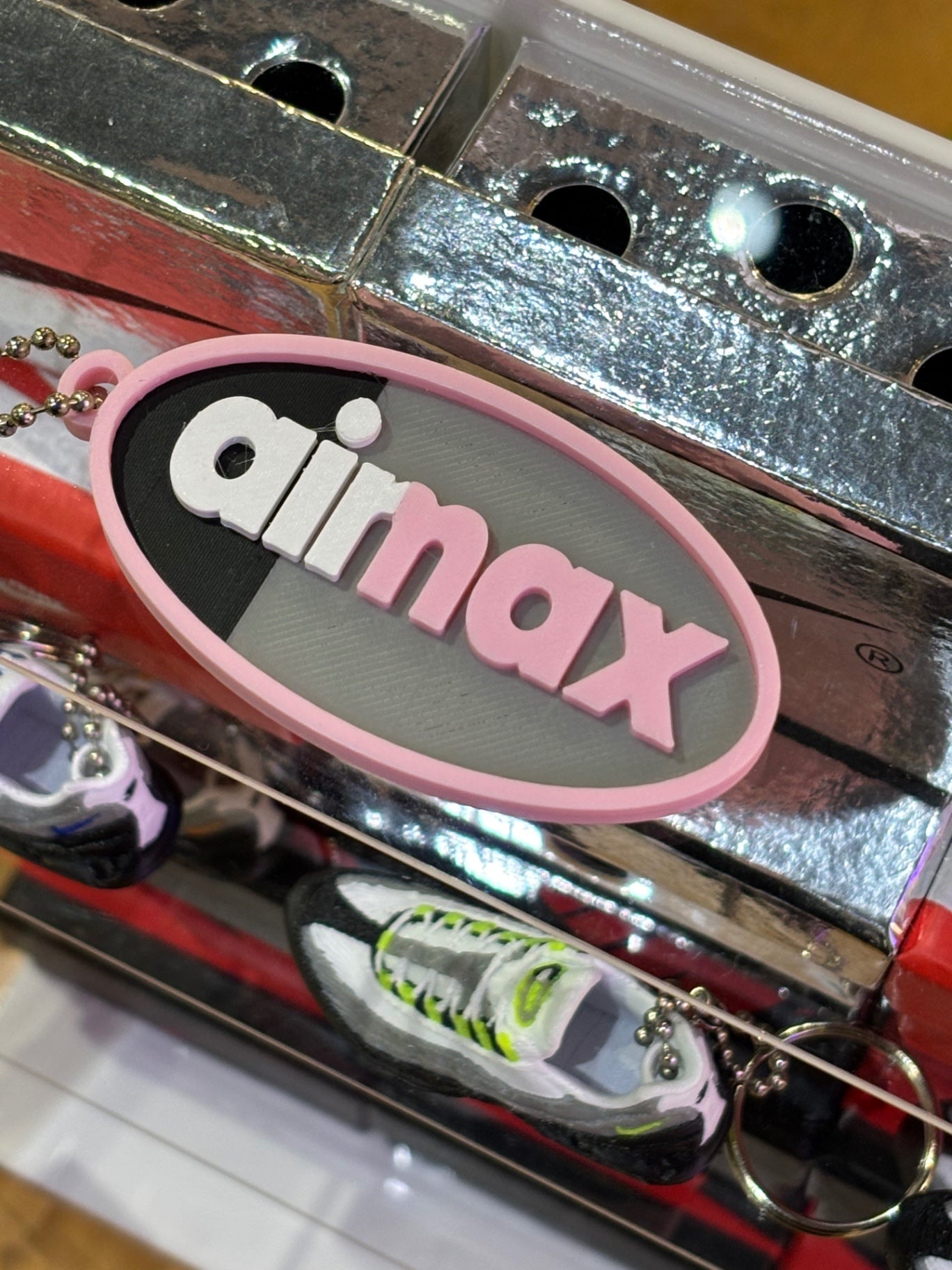 110 logo keychain pink foam