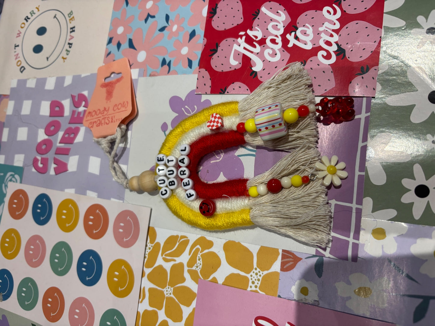 Red/yellow Cute But Feral Car Charm