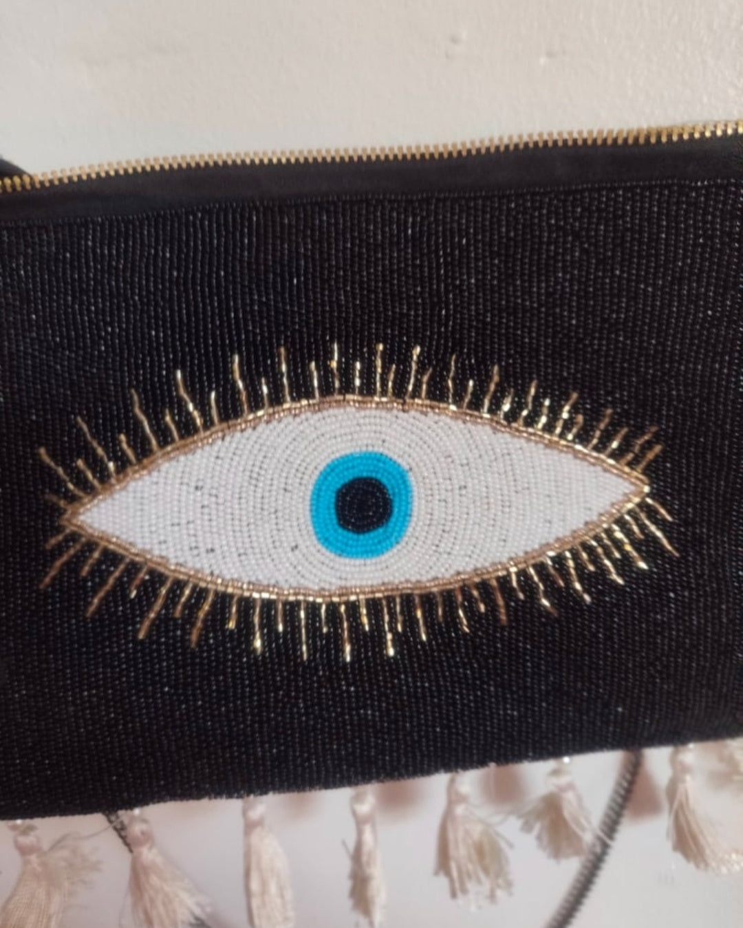 Evil eye protection bag with multi coloured headband to match