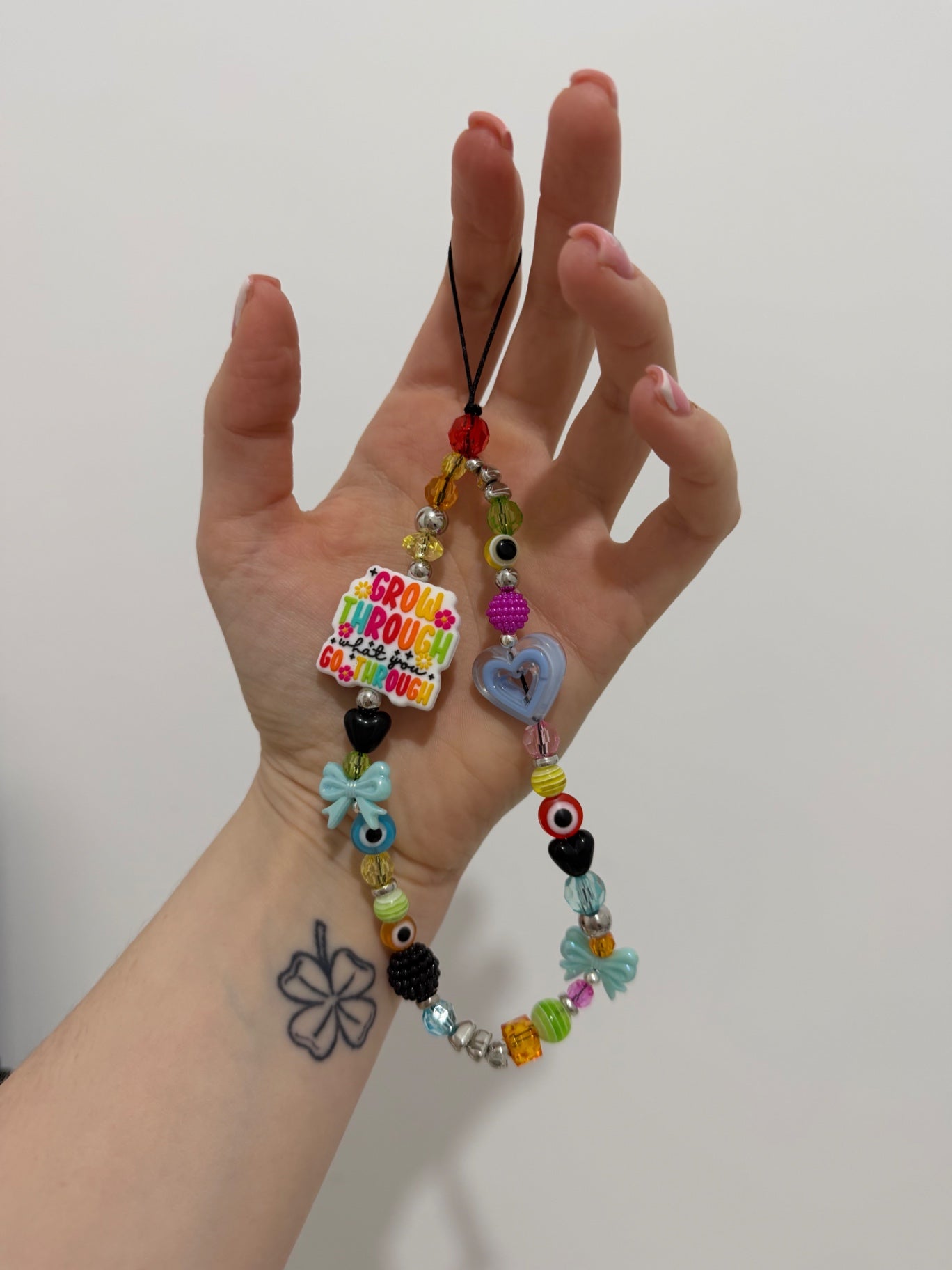 ‘Grow through’ phone charm - silver