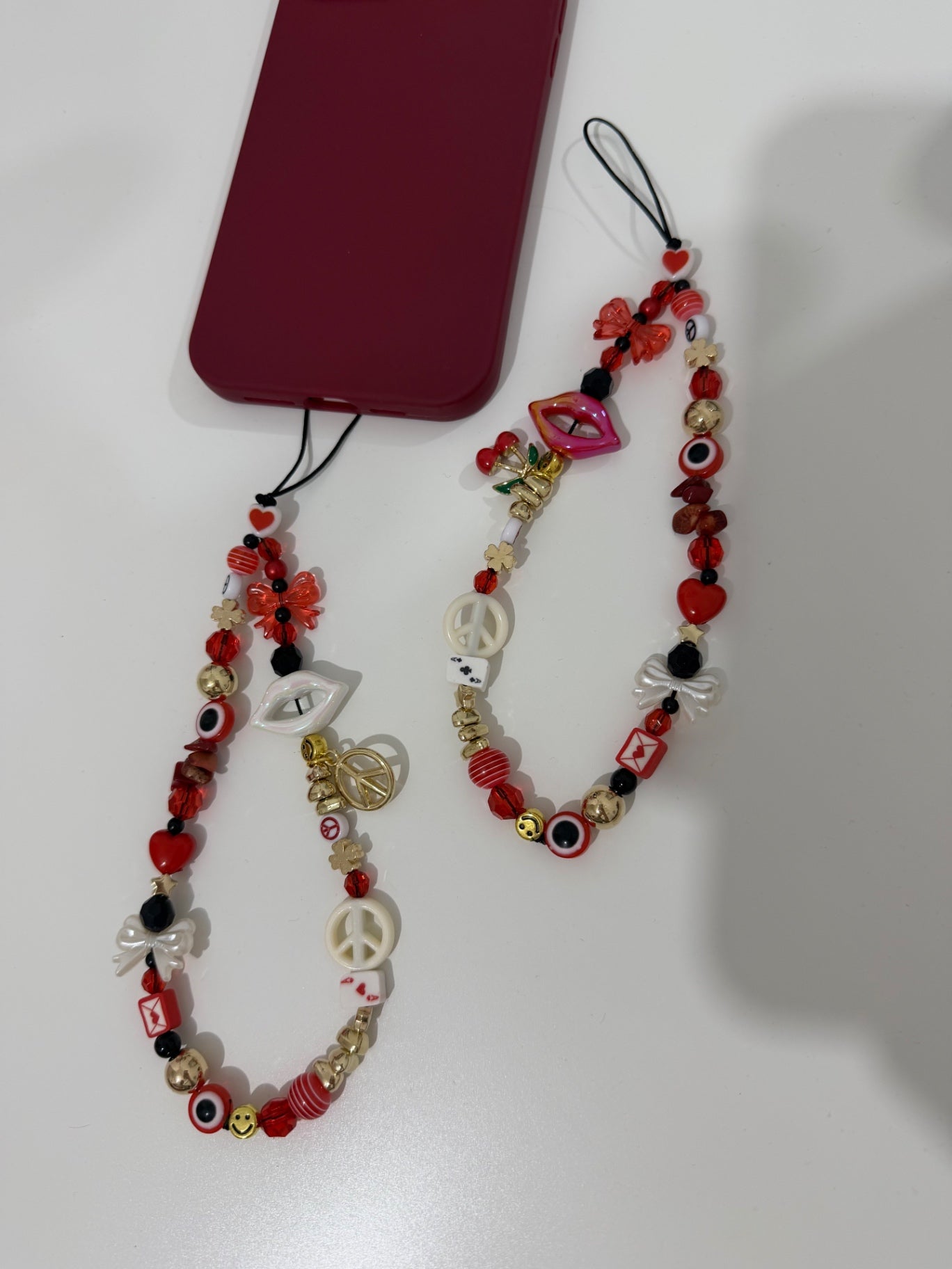 Red Temptation phone charm - gold