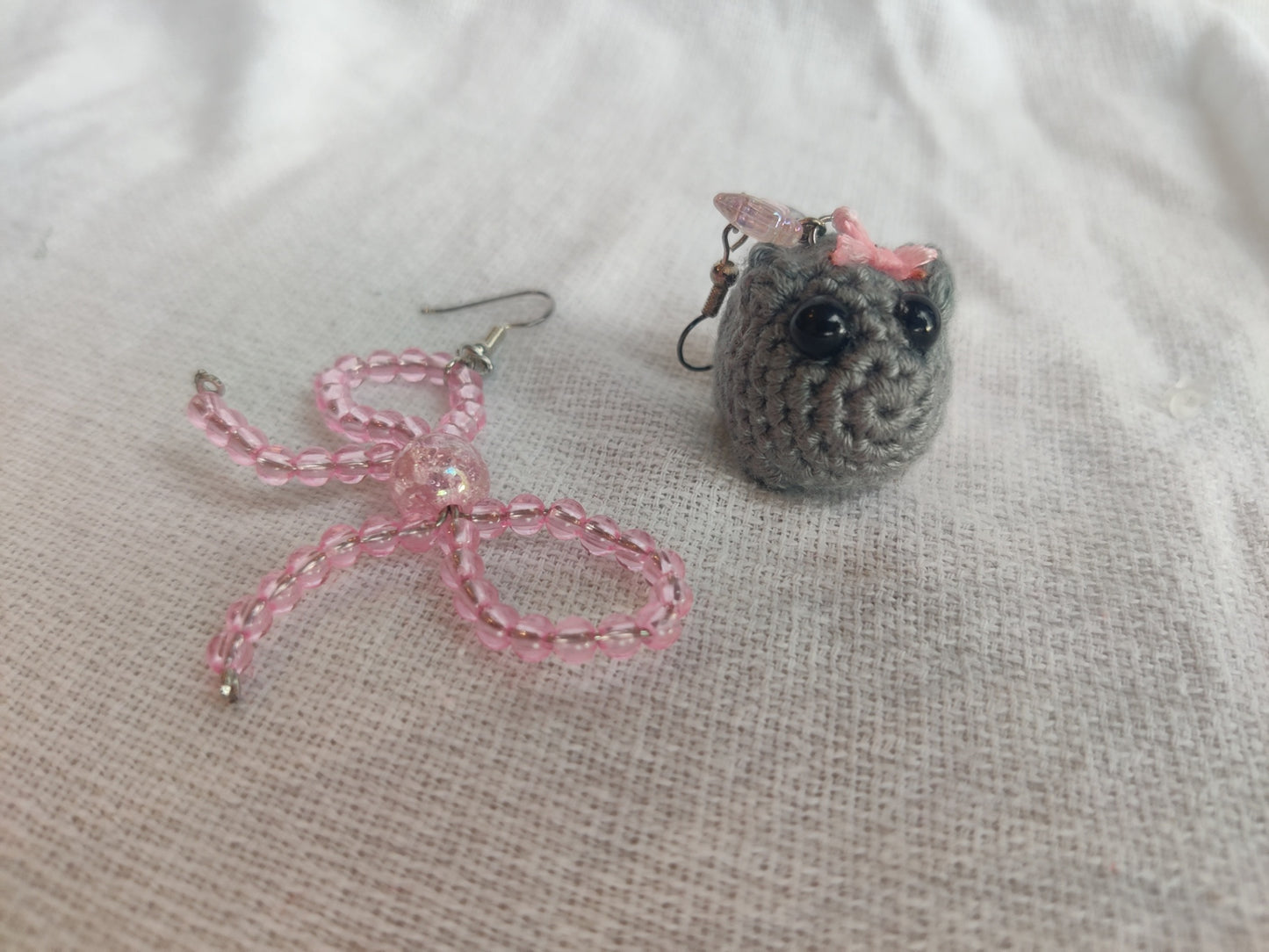 Crochet sad hamster and bow earrings