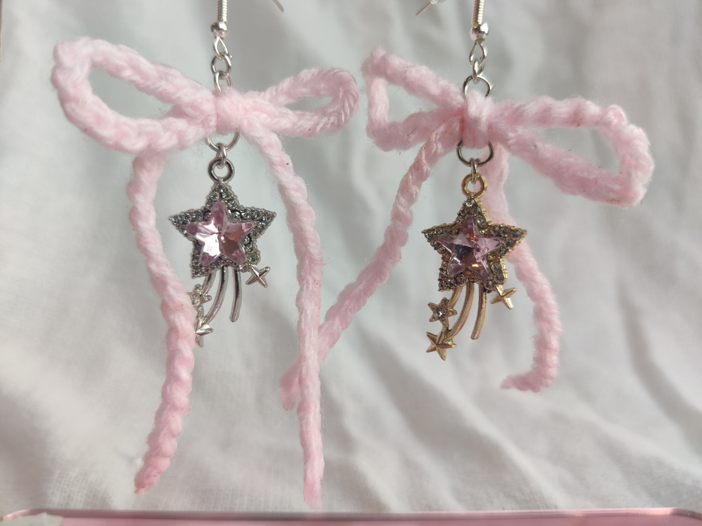 Crochet light pink bow earrings with star charms