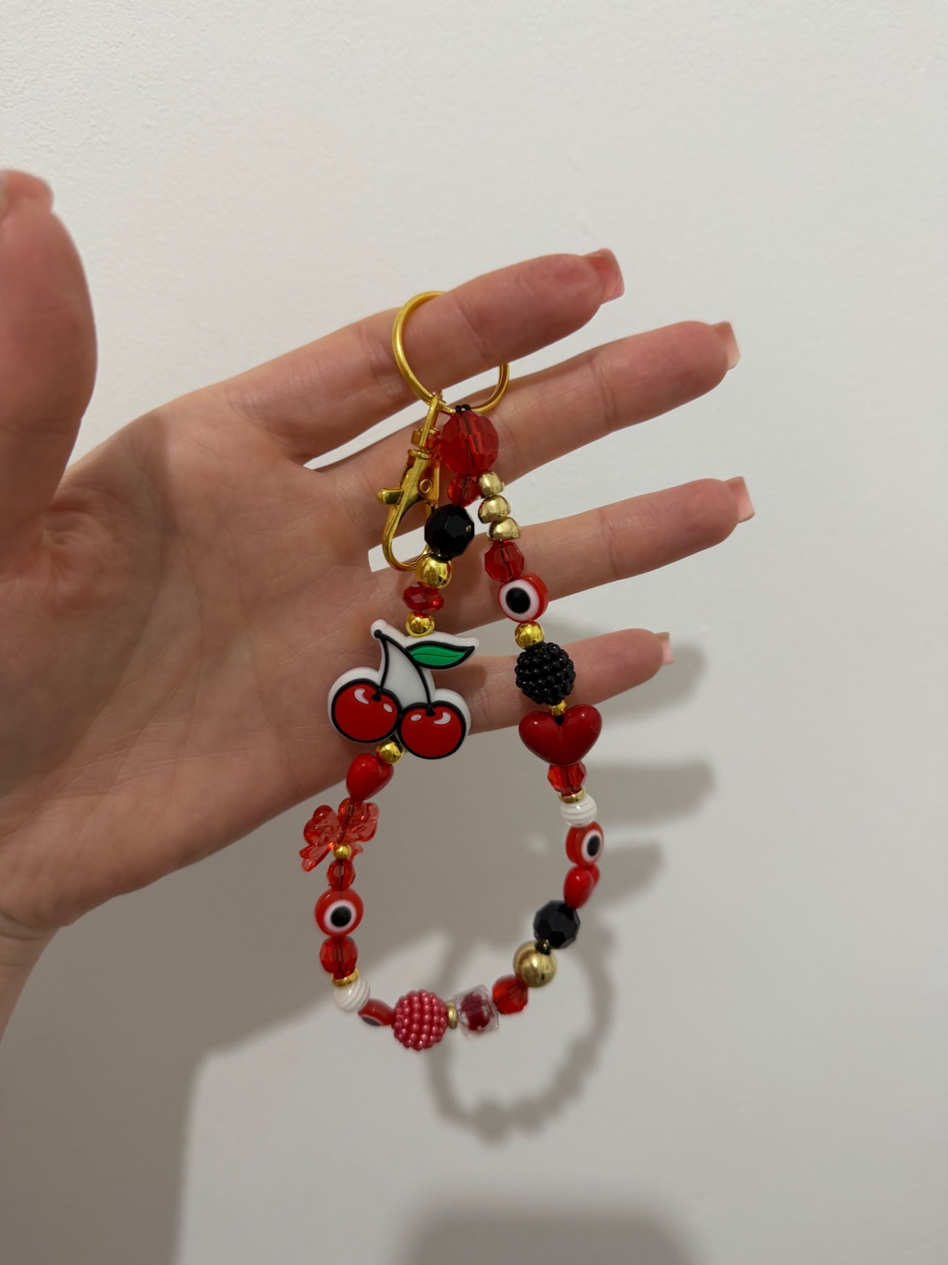 ‘Kiss my cherry’ keyring - gold