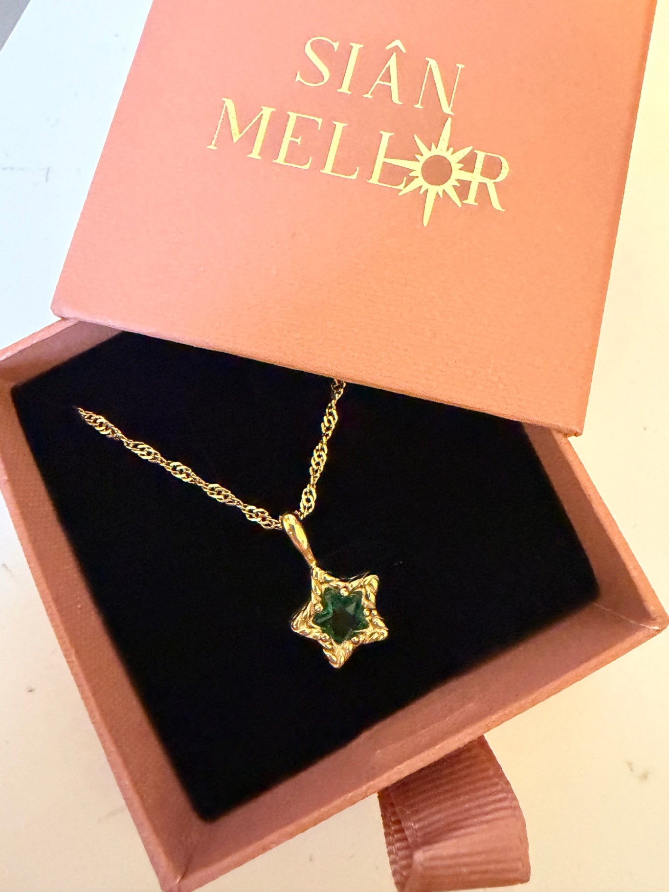 Green star necklace
