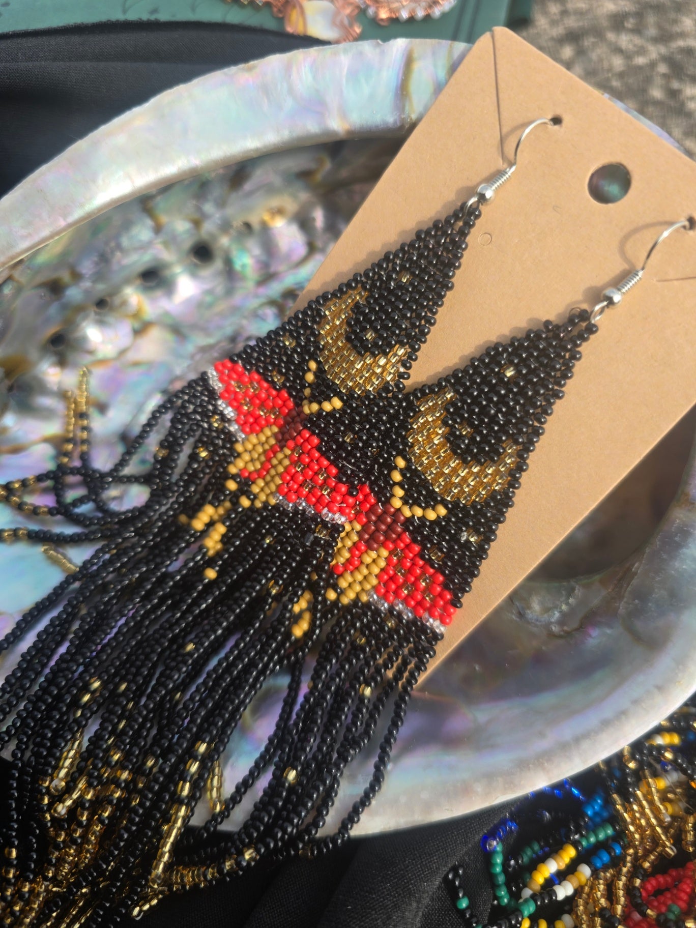 Beaded red moth earrings