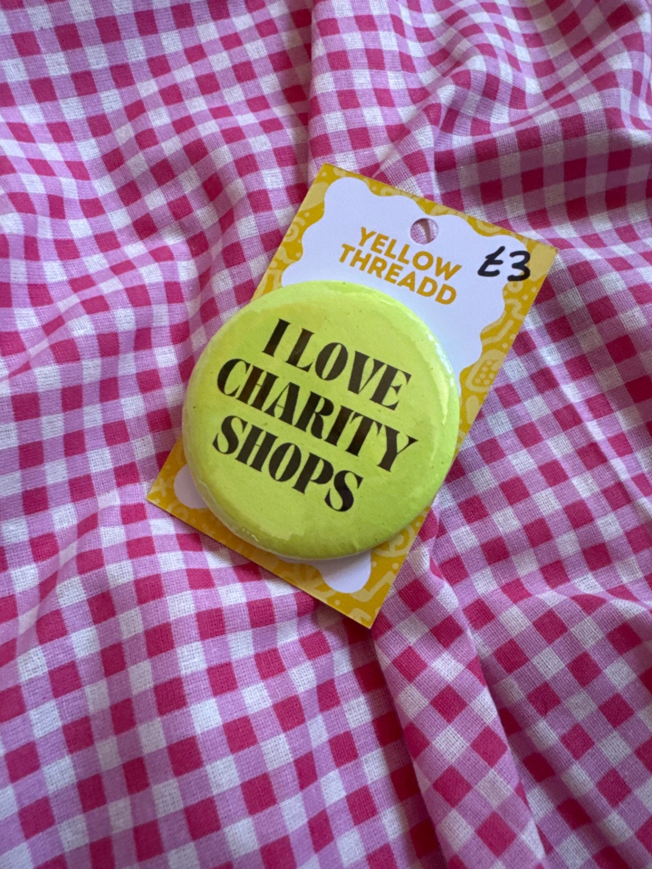 Charity shop badge