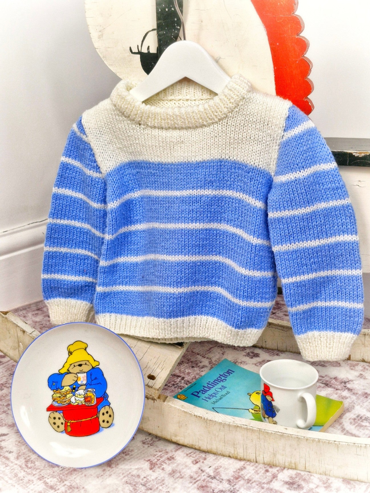 Blue and white striped jumper