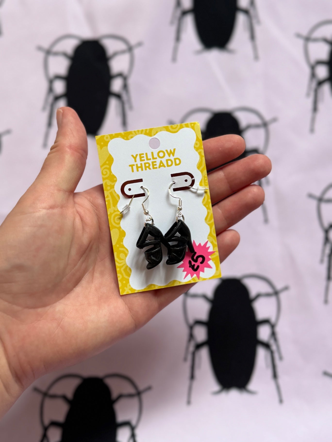 Black heel shoe earrings