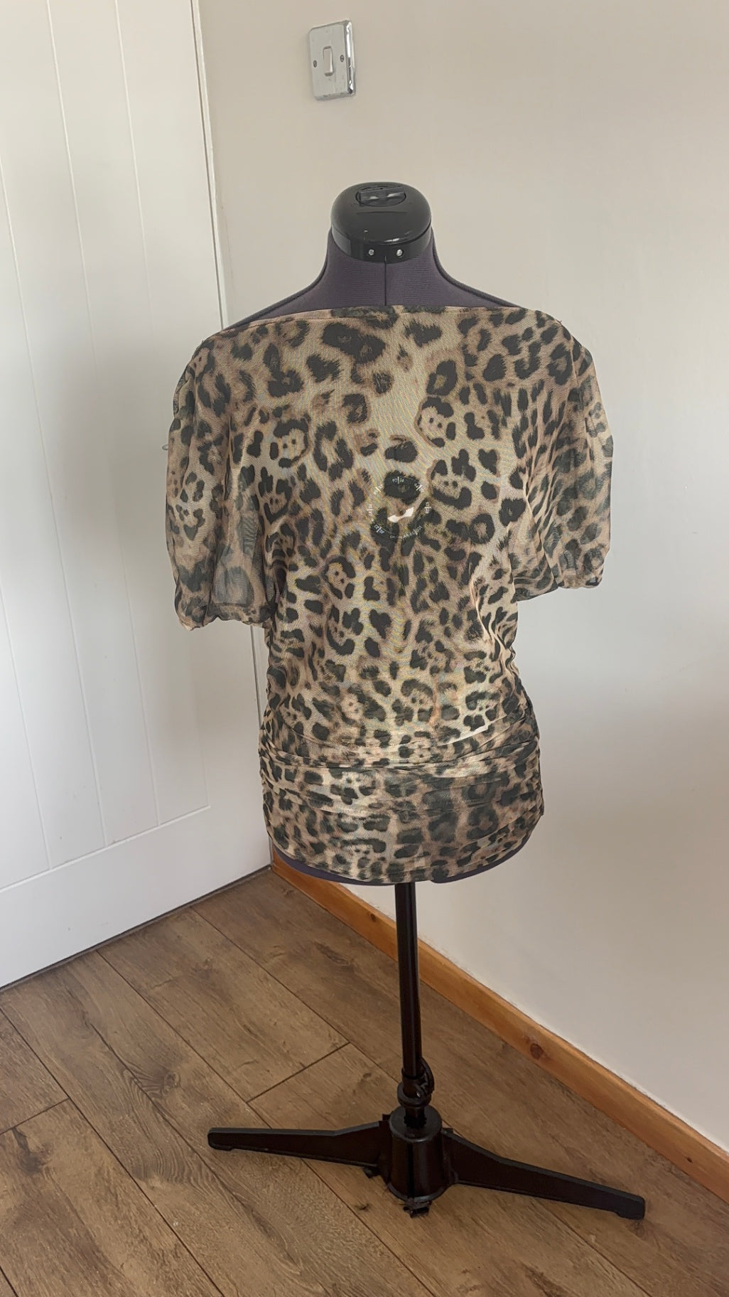 Leopard print off shoulder top and ruched skirt