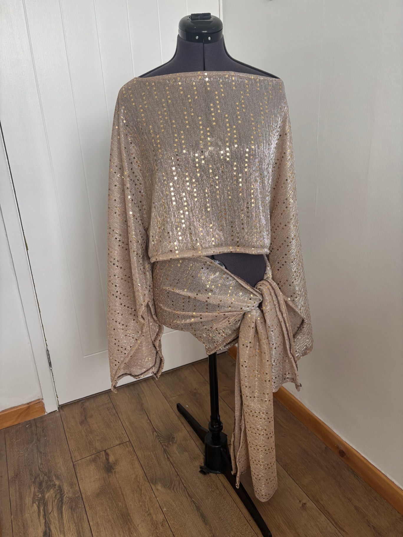 gold poncho top and sarong skirt set