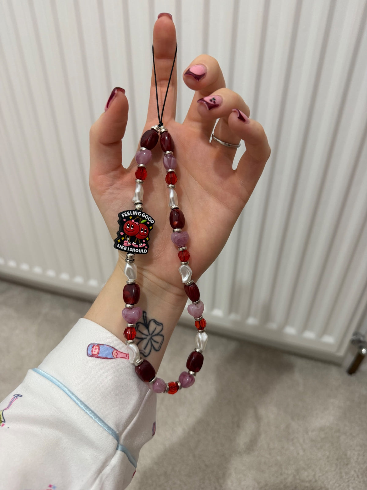 ‘Feeling good like I should’ phone charm