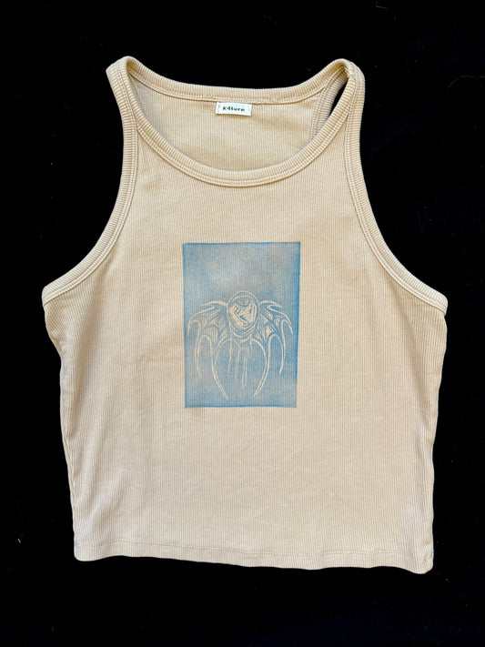 Beige crop racer top with blue eye / wings design
