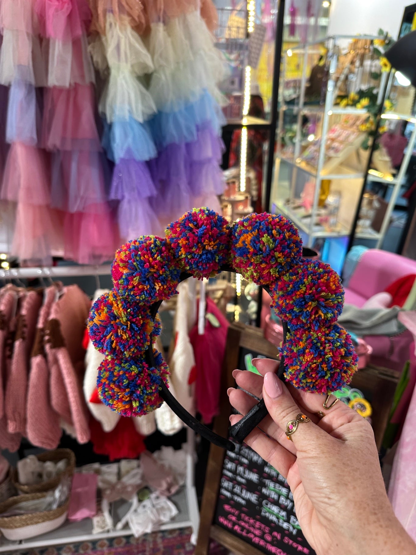 Multi coloured mini pom