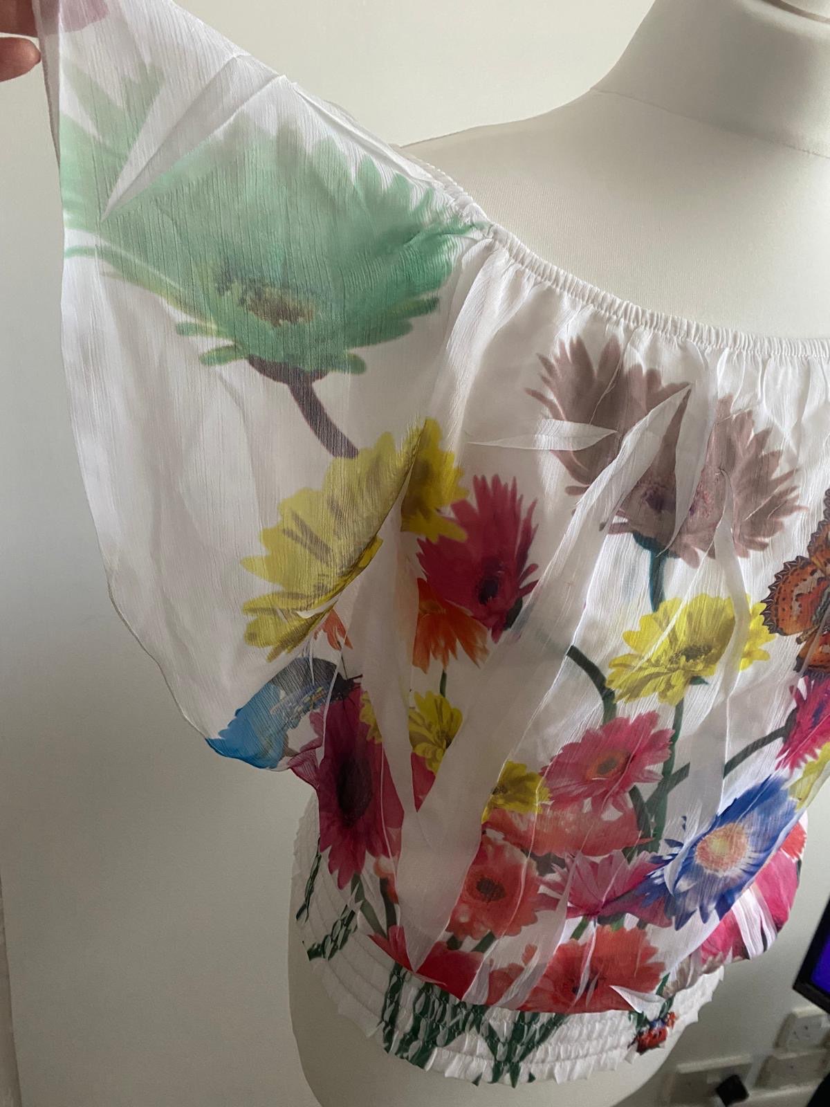 One shoulder white top with flowers 