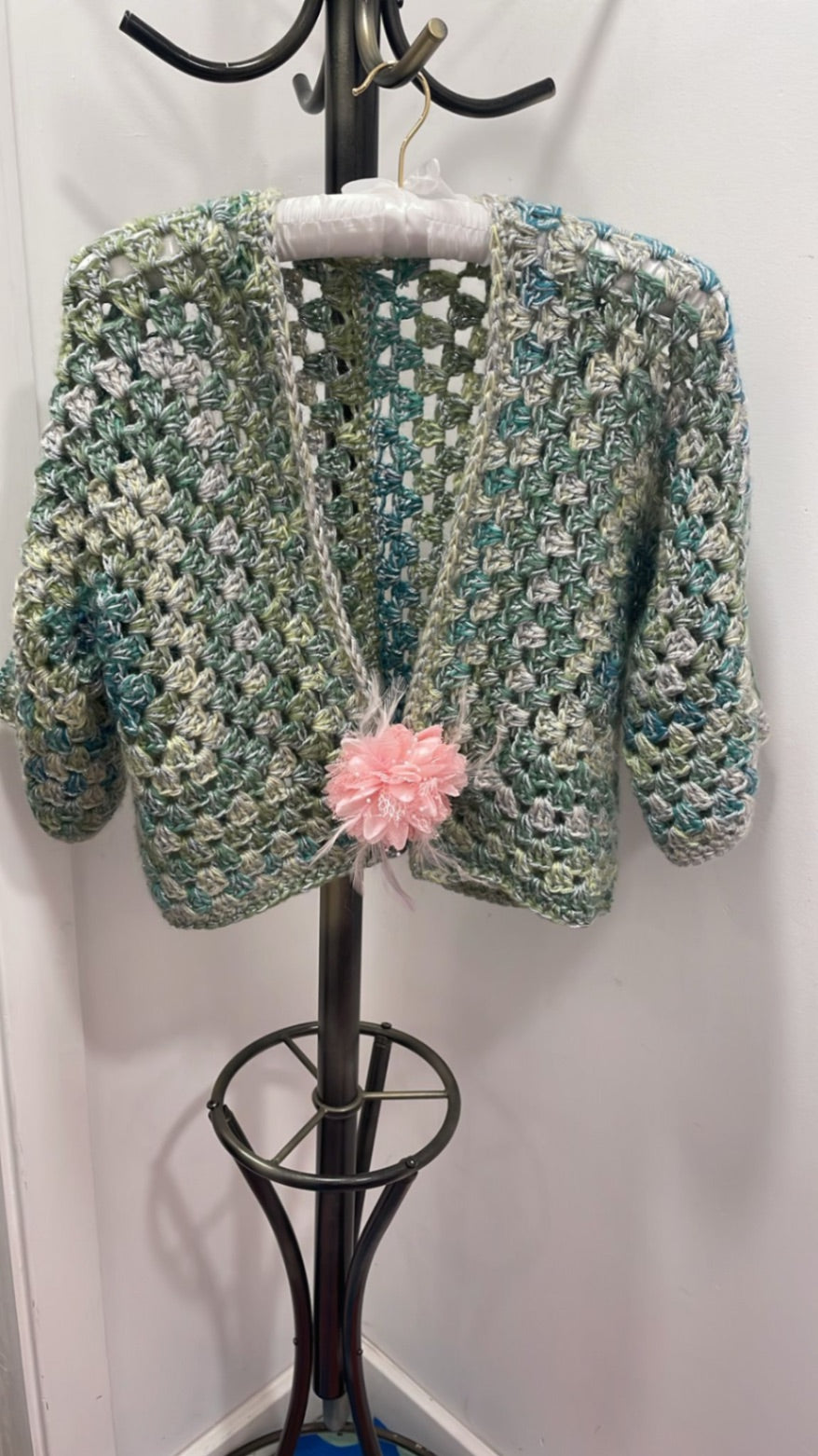 Green jacket pink flower