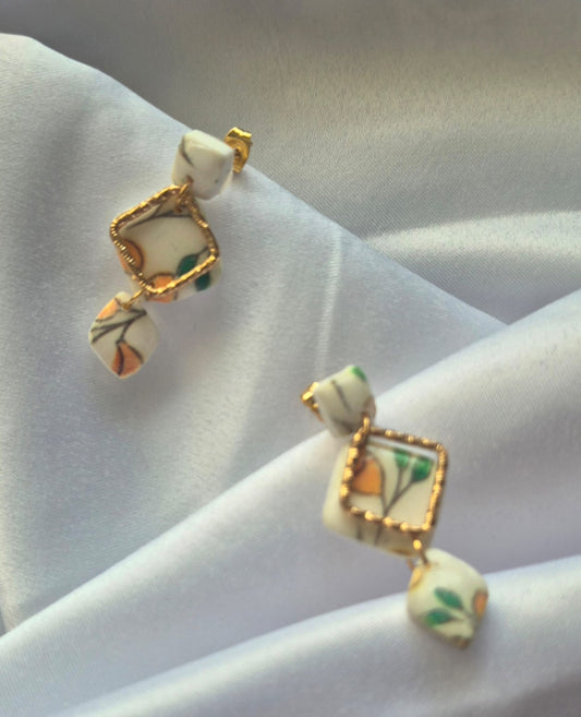 3-tier abstract lemon earrings with metal decal