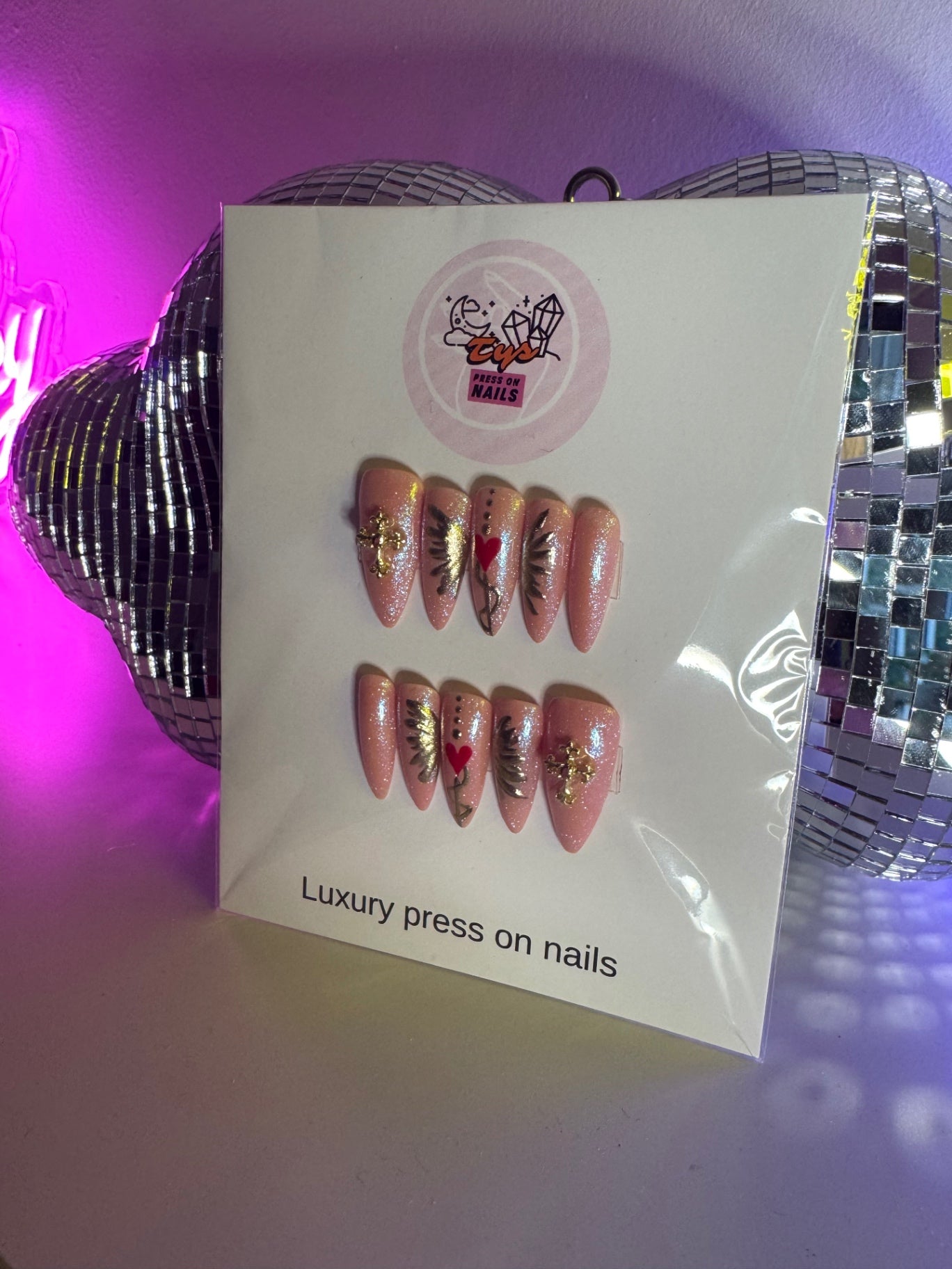 Red Heart gold wing nude