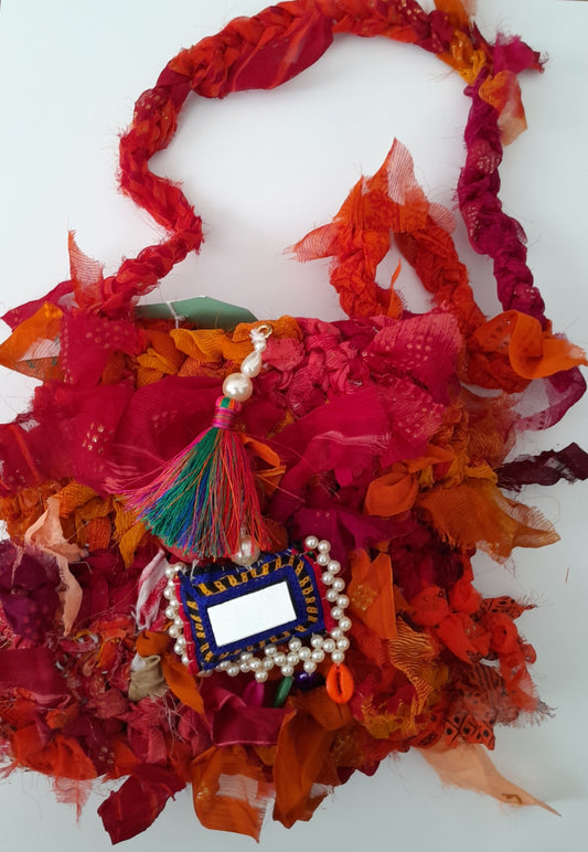 Ragbag with mirror decoration 