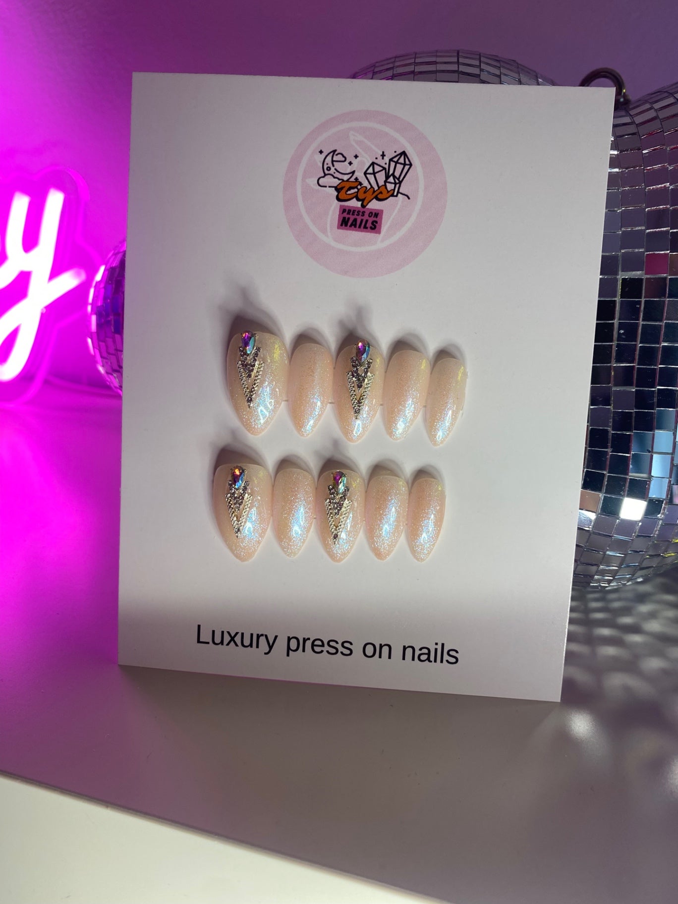 Nude Iridescent with silver crystal charms