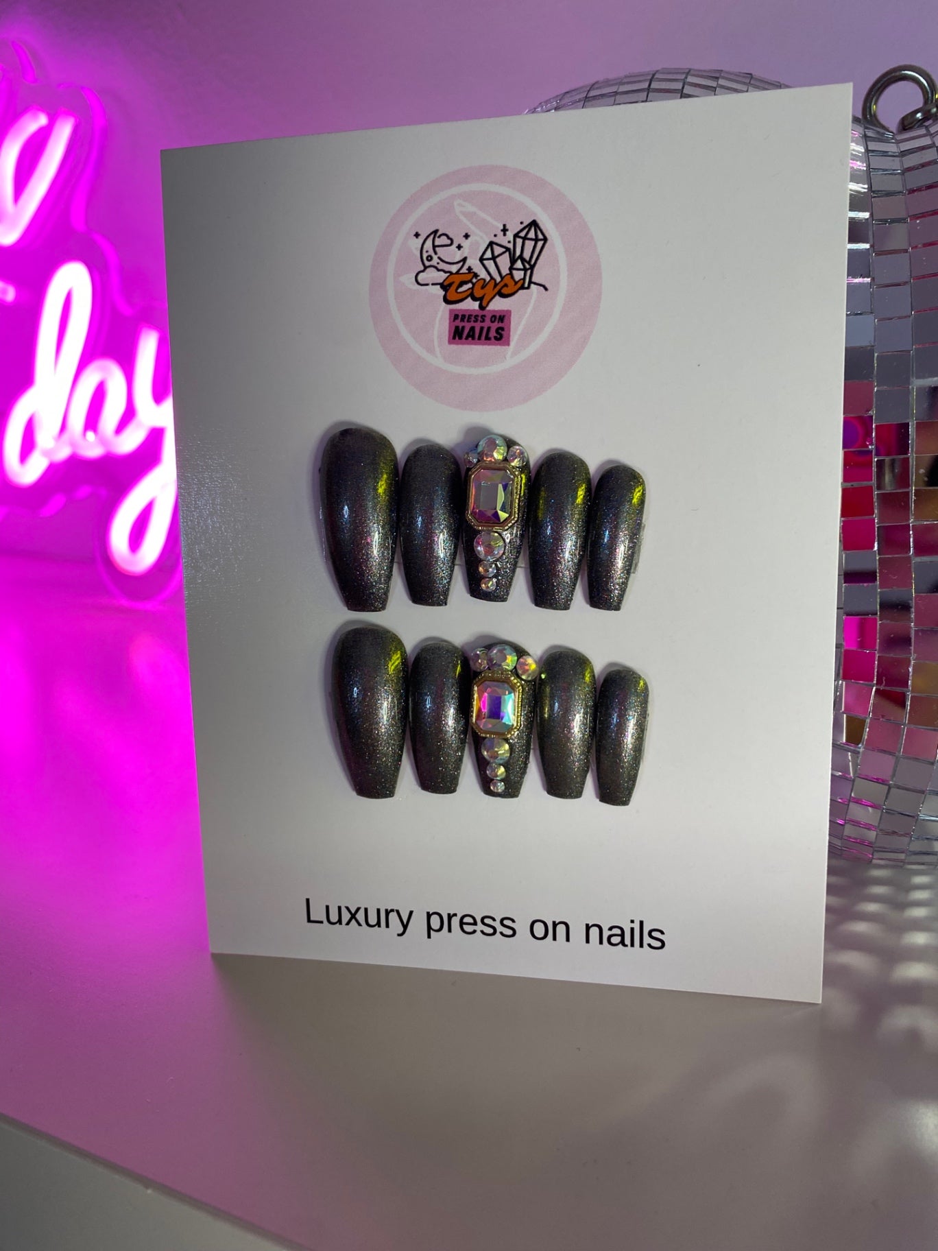 Dark iridescent with crystals