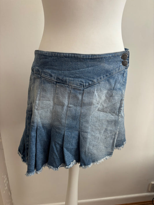 Pleated asymmetrical denim skirt