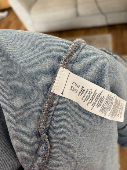 Pleated asymmetrical denim skirt