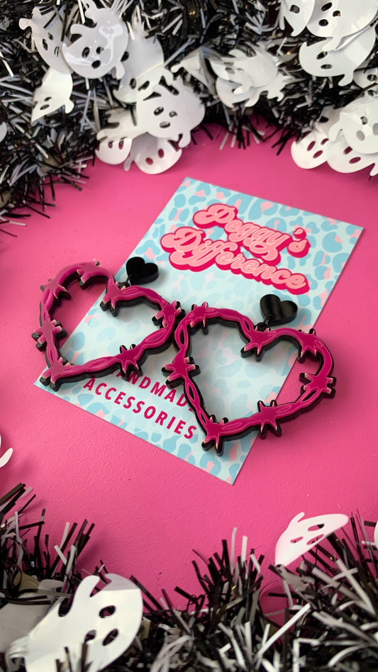 Pink and black barbed wire heart earrings