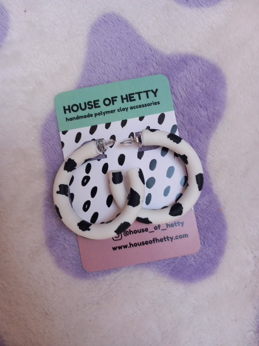 Large cow print polymer clay hoop earrings 