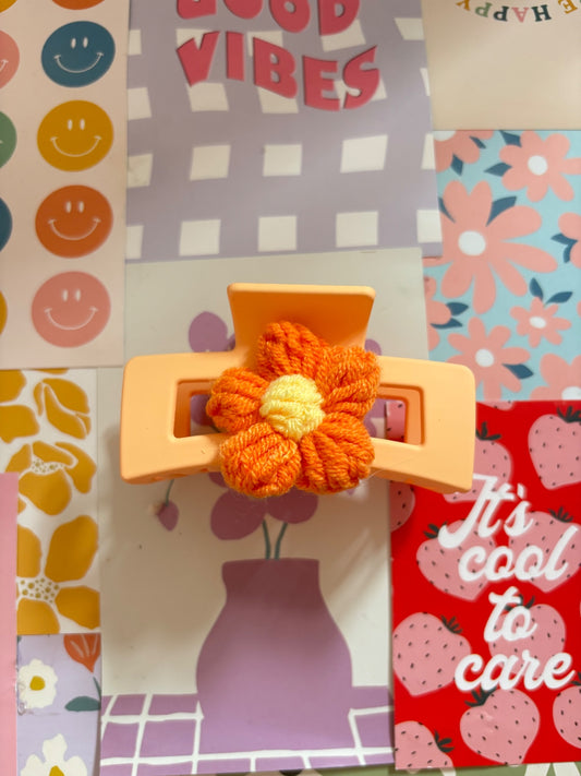 Orange flower claw clip