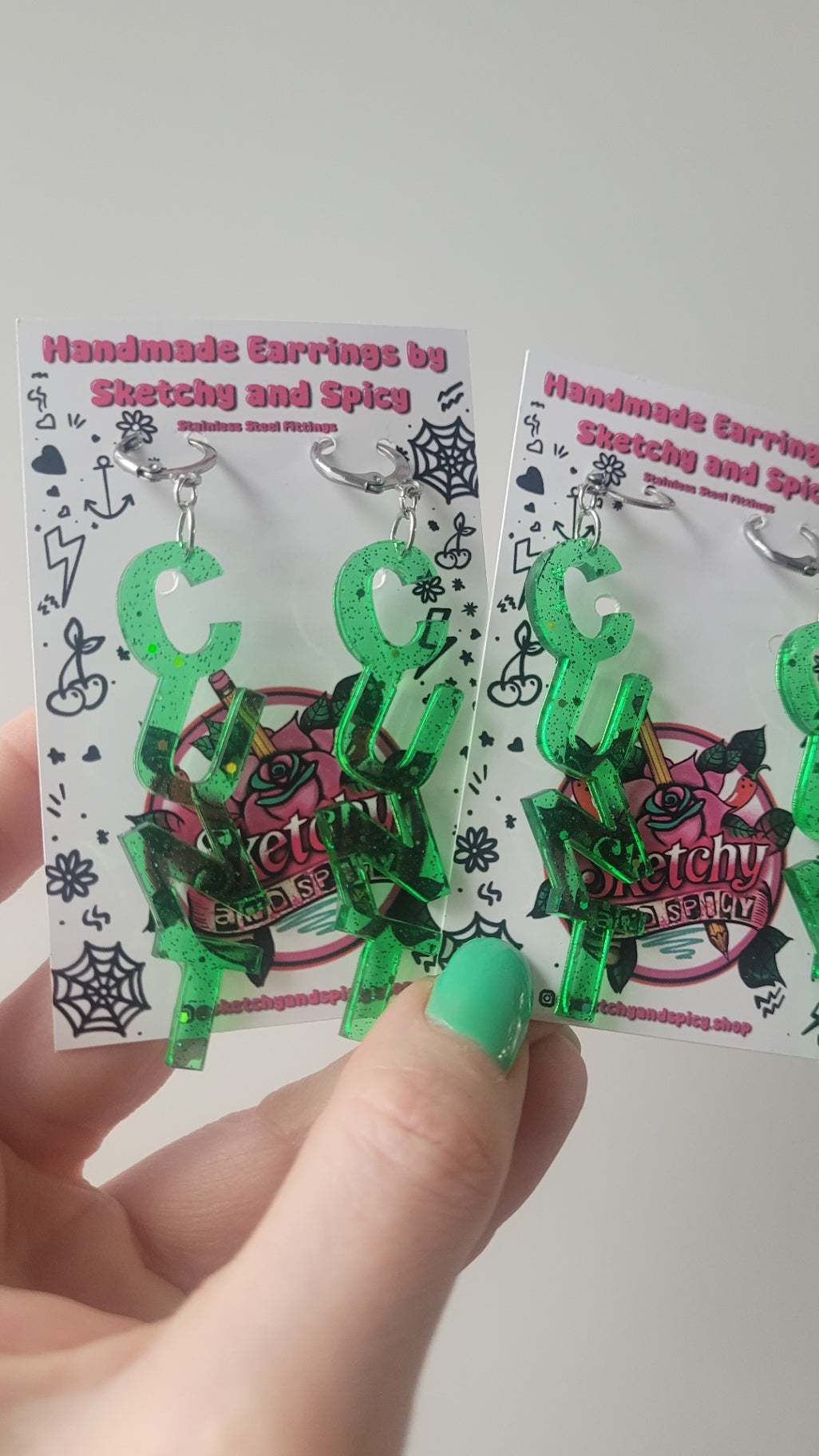 NT Green Glitter Earrings – Stainless Steel Silver Hoops