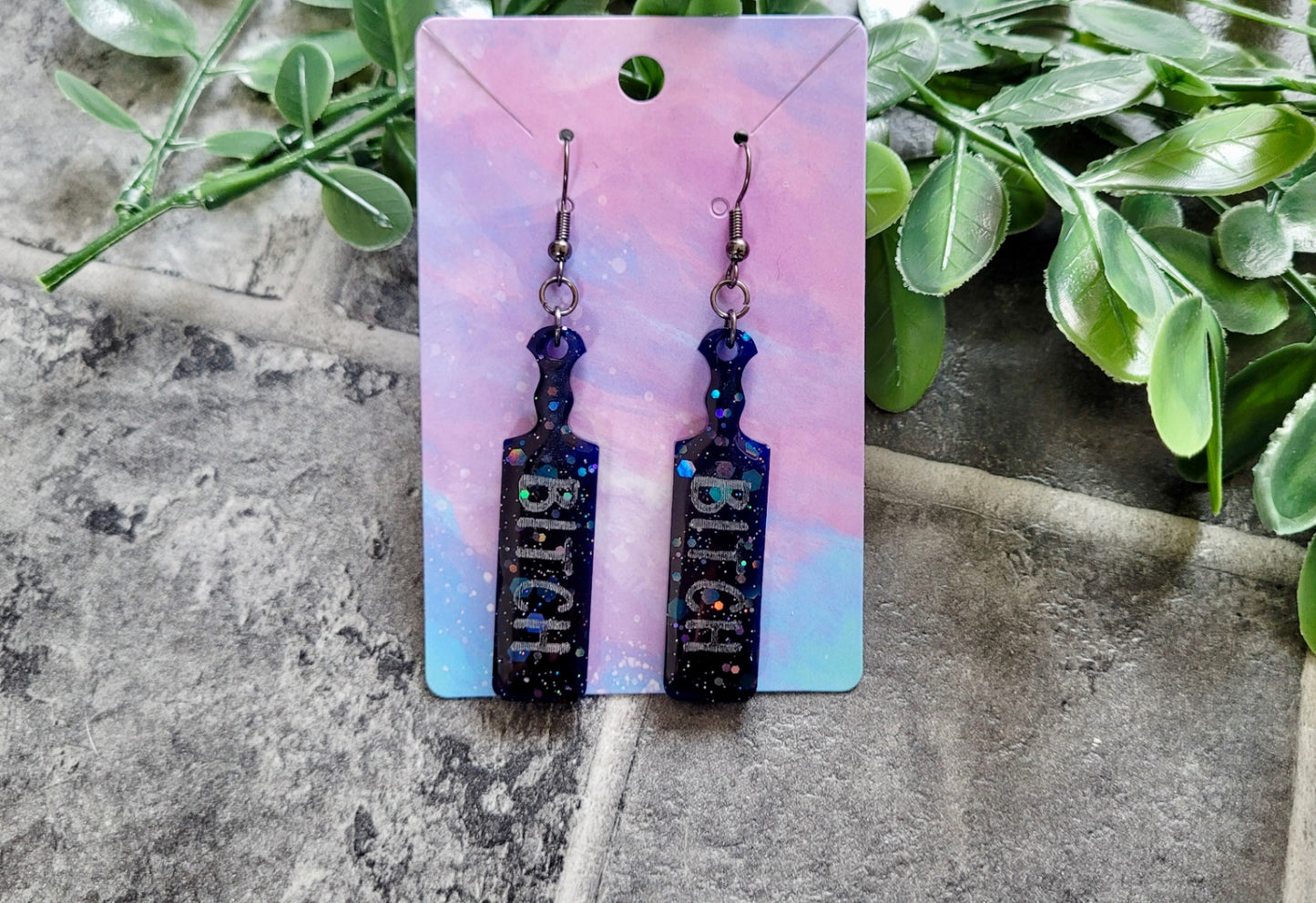 Dark Blue-Black Glitter Paddle Earrings – “BITCH” Silver Text - with Stainless Steel Gunmetal Hooks