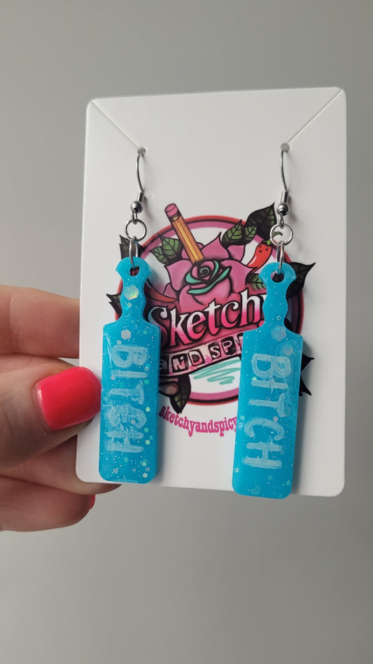 Light Blue Glitter Paddle Earrings – “BITCH” White Text - with Silver Hooks