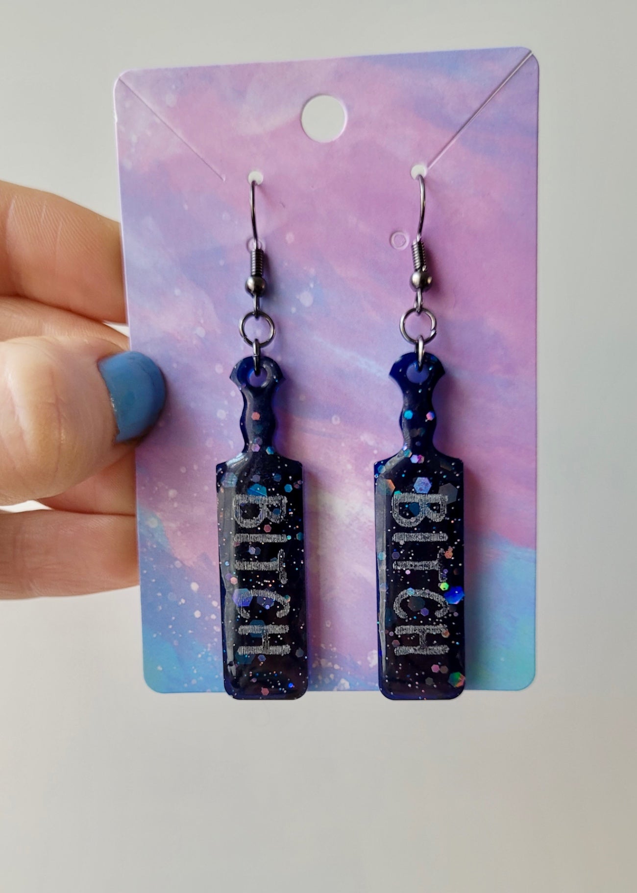 Dark Blue-Black Glitter Paddle Earrings – “BITCH” Silver Text - with Stainless Steel Gunmetal Hooks