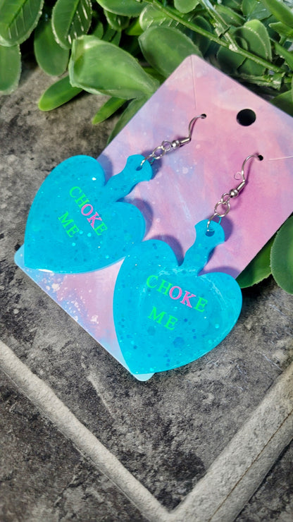 CHOKE ME Light Blue Glitter Heart Paddle Earrings with Green & Pink Text - Stainless Steel Hooks
