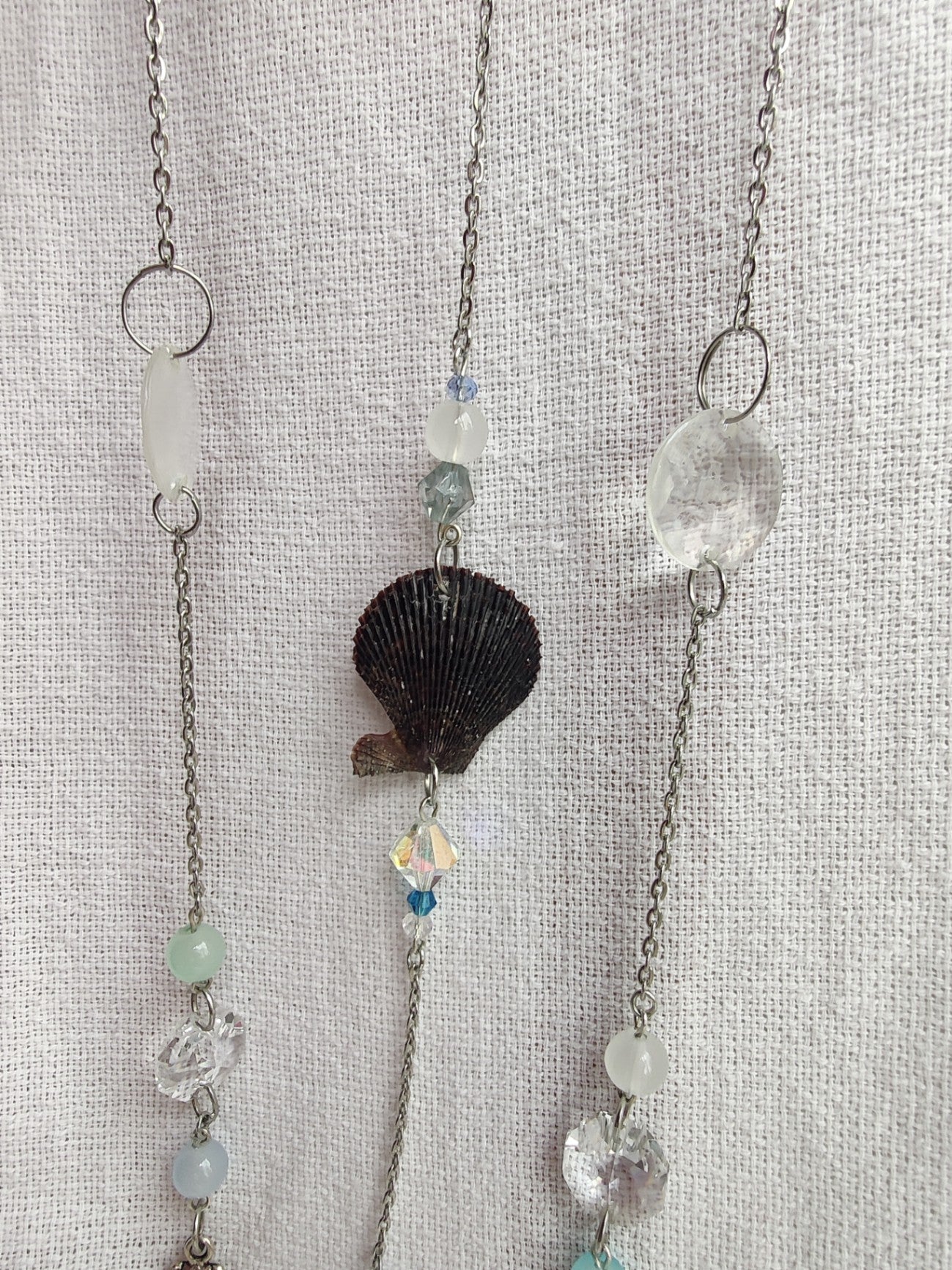 Crochet cloud suncatcher with shell