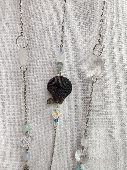 Crochet cloud suncatcher with shell